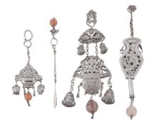 A group of four Chinese silver robe pendants, late Qing dynasty A group of four Chinese silver