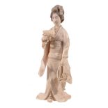 An Ivory Okimono of a Bijin , she stands wearing an elegant ko-sode kimono... An Ivory Okimono of