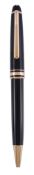 Montblanc, Meisterstuck, a black ballpoint pen,   with a black cap and barrel, with gilt trim, in a