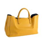 Anya Hindmarch, Ebury, a mustard yellow capra leather bag  , with the gold-tone Anya Hindmarch bow,