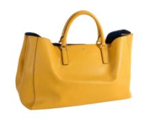 Anya Hindmarch, Ebury, a mustard yellow capra leather bag  , with the gold-tone Anya Hindmarch bow,