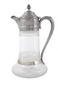 A Victorian silver mounted cut glass claret jug by Horace Woodward  &  Co.,   London 1879, with a