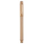 Caran D¬he, China, a cream lacquer rollerball pen,   with a facetted cream lacquer barrel and