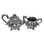 An early Victorian silver lobed baluster tea pot and matching sugar basin by William Hunter,