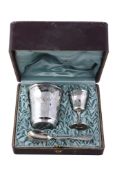 A mid- 20th century French silver christening set,   comprising: a beaker, an egg cup and a spoon,