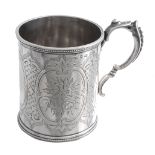 A Victorian silver cylindrical christening mug by George Unite,   Birmingham 1868, with a beaded