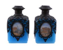 A pair of  French Palais Royal blue glass and gilt mounted scent bottles,   circa 1850, set with