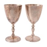 A cased pair of silver commemorative goblets by Courtman Silver Ltd.,   London 1977, the bodies