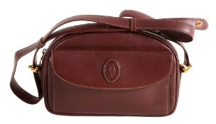 Must de Cartier, a small Bordeaux leather shoulder bag,   with a flap pocket embossed with the