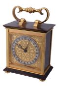 Hausmann  &  Co., a brass and lacquer table clock,   alarm movement, silvered Roman numeral chapter