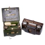 A green leather small travelling case with silver and ivory fittings by G. H. James  &  Co.,