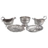 A pair of silver oval sauce boats by Walker  &  Hall,   Sheffield 1926; two sweet baskets, by A.