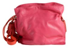 Loewe, a pink leather shoulder bag,   with a contrasting red leather drawstring with tassels on