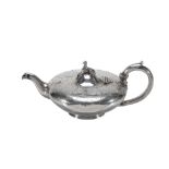 An early Victorian silver compressed circular tea pot by William Richards,   London 1842, with a