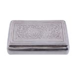 A Moroccan or Algerian silver rectangular box,   stamped marks, 19th century, the cover engraved