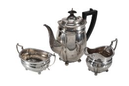 A silver swollen oblong three piece coffee service by C. S. Harris  &  Sons,   London 1925-26, the