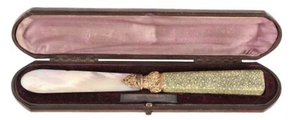 A 19th century gold mounted mother of pearl and shagreen paper knife,   with a mother of pearl