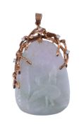 A jade and diamond pendant,   the twisted branch like 9 carat gold setting with brilliant cut