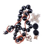 A collection of antique jewellery,   comprising a graduated banded onyx bead necklace, 39cm long,