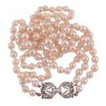 A two row cultured pearl necklace,   circa 1950, the graduated cultured pearls measuring 5mm to