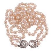 A two row cultured pearl necklace,   circa 1950, the graduated cultured pearls measuring 5mm to