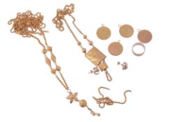 A small collection of gold coloured jewellery  , comprising: two fancy link necklaces; a gold