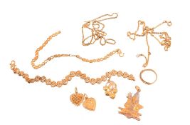 A collection of  gold coloured jewellery,   to include: a heart shaped pendant with a partial