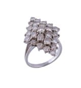 A diamond dress ring  , the marquise shaped panel set throughout with brilliant cut diamonds,