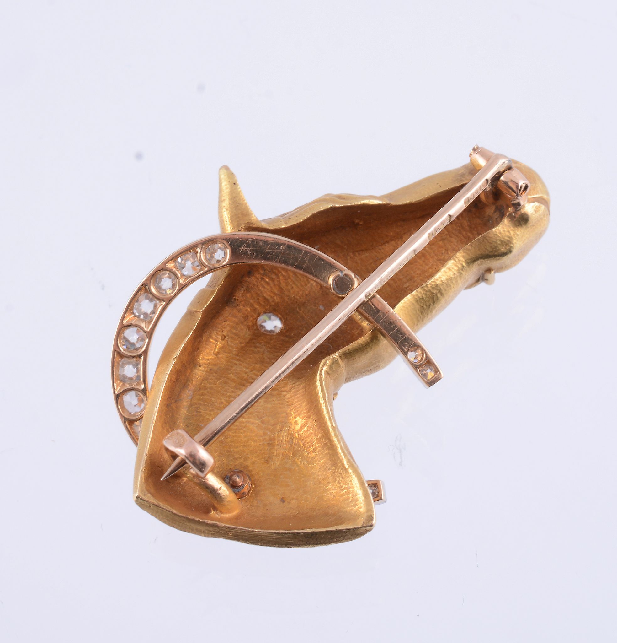 An early 20th century horse head brooch,   circa 1900, the bridled horse with an old cut diamond - Image 2 of 2
