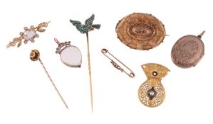 A collection of antique jewellery,   comprising a quartz and seed pearl foliate bar brooch, circa