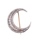 A late Victorian diamond crescent brooch,   circa 1880, set with rose cut diamonds and a central