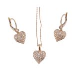 A diamond heart pendant,   the heart shaped pendant set throughout with brilliant cut diamonds,