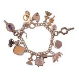 An 18 carat gold curb link charm bracelet,   the bracelet stamped 18, suspending various charms,