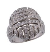 A diamond bombe dress ring,   the pierced domed panel set throughout with brilliant cut diamonds,