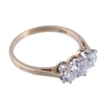 An 18 carat gold diamond ring,   set with three brilliant cut diamonds, stamped 750 with London