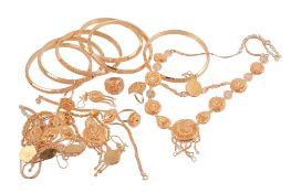 A selection of gold coloured jewellery,   to include: six bangles; two bracelets; four rings; three