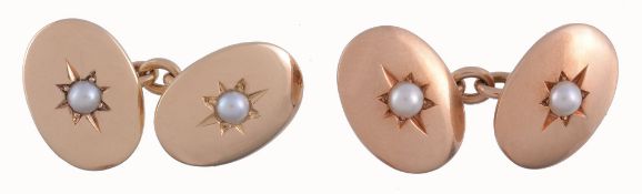 A pair of gold and pearl double sided cufflinks,   the oval panel set with a central pearl in a