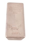 A five kilo silver coloured bar,   stamped Umicore, Feinsilber 999, 5000g, 410387, 16.5cm high