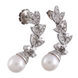 A pair of cultured pearl and diamond earrings,   the 9mm cultured pearls with an eight cut diamond