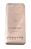 A one kilo silver coloured bar,   stamped Metalor, 1 Kilo, Silver, 999.0, Switzerland, K239178, 11.