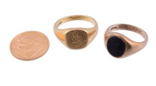 A signet ring,   the central panel engraved with a monogram, with an inner engraving, finger size X