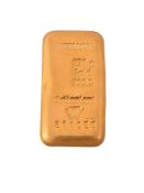 A 250g gold coloured bar,   stamped Metalor, 250g, Gold, 999.9, Switzerland, 811022, 5.8cm high