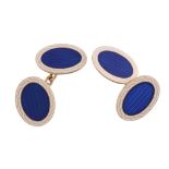 A pair of blue enamel double sided cufflinks,   the  oval panels with a central oval panel of blue