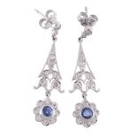 A pair of sapphire and diamond flower head ear pendents  , each stud set with eight brilliant cut