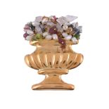 A gem set giardinetto brooch,   the polished reeded vase containing a foliate spray of vari cut