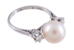 A cultured pearl and diamond ring,   the central 10mm cultured pearl between two claw set brilliant
