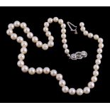 A cultured pearl necklace,   composed of graduating circular shaped cultured pearls, on a knotted