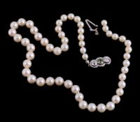 A cultured pearl necklace,   composed of graduating circular shaped cultured pearls, on a knotted
