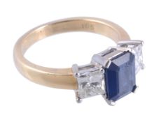 A sapphire and diamond ring,   the central rectangular shaped sapphire in a four claw setting,