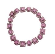 A pink sapphire bracelet,   composed of circular and square shaped panels set throughout with  vari